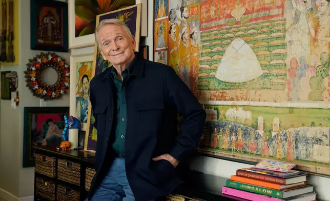 FILE - Costume and fashion designer Bob Mackie poses at his home in Palm Springs, Calif., on Oct. 20, 2021. (AP Photo/Chris Pizzello, File)