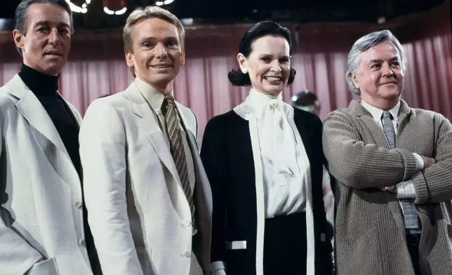 FILE - Fashion designers, from left, Halston, Bob Mackie, Gloria Vanderbilt and Geoffrey Beene pose on the set of the "Love Boat" for a fashion-themed episode in Los Angeles on Feb. 3, 1981. (AP Photo/Wally Fong, File)