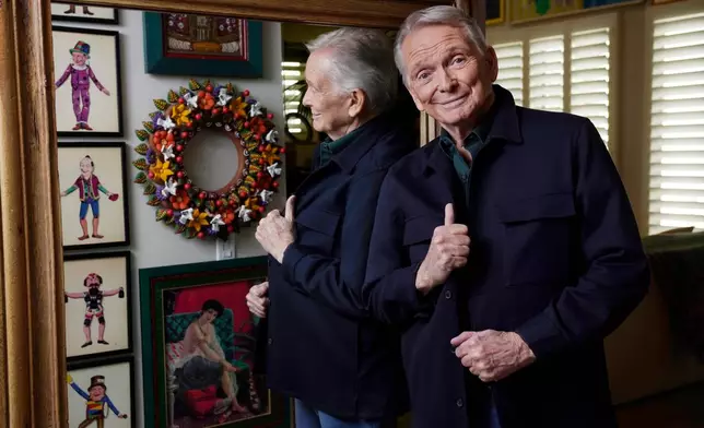 FILE - Costume and fashion designer Bob Mackie poses for a portrait at his home in Palm Springs, Calif., on Oct. 20, 2021. (AP Photo/Chris Pizzello, File)