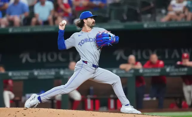 Toronto Blue Jays starting pitcher Dylan Cease throws to the Texas Rangers during the second inning of a baseball game Friday, Sept. 18, 2026, in Arlington, Texas. (AP Photo/Julio Cortez)