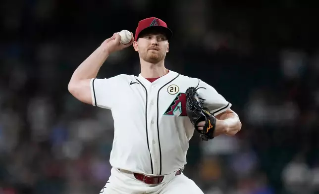 Arizona Diamondbacks starting pitcher Michael Soroka throws against the Miami Marlins during the first inning of a baseball game, Tuesday, Sept. 15, 2026, in Phoenix. (AP Photo/Ross D. Franklin)