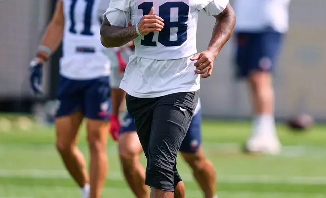 New England Patriots wide receiver Kyle Williams runs during an NFL football practice, Wednesday, Sept. 16, 2026, in Foxborough, Mass. (AP Photo/Charles Krupa)