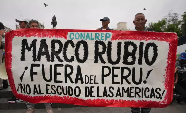 People protest the visit of U.S. Sec. of State Marco Rubio in Lima, Peru, Wednesday, Sept. 9, 2026. (AP Photo/Guadalupe Pardo)
