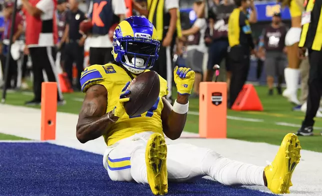 Los Angeles Rams wide receiver Davante Adams (17) celebrates after a touchdown catch during the second half of an NFL football game against the New York Giants in Inglewood, Calif., Monday, Sept. 21, 2026. (AP Photo/Katie Chin)