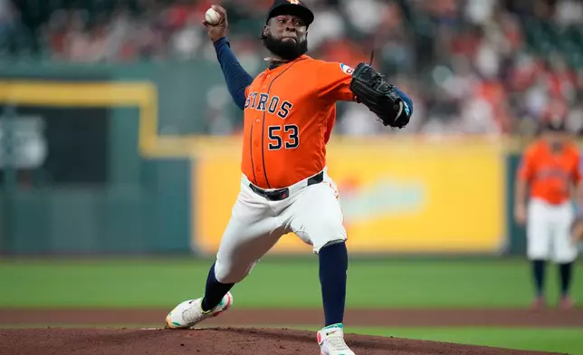 Houston Astros starting pitcher Cristian Javier throws during the first inning of a baseball game against the Arizona Diamondbacks in Houston, Friday, Sept. 4, 2026. (AP Photo/Ashley Landis)