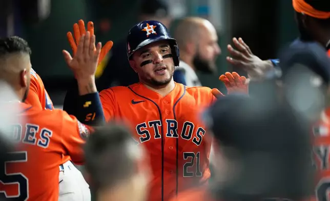 Houston Astros' Yainer Diaz celebrates after hitting a home run during the third inning of a baseball game against the Arizona Diamondbacks in Houston, Friday, Sept. 4, 2026. (AP Photo/Ashley Landis)