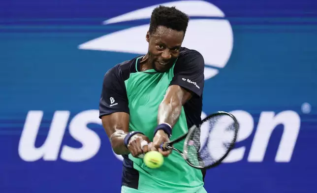 Gael Monfils, of France, hits a return to Learner Tien, of the United States, during the second round of the U.S. Open tennis championships, Thursday, Sept. 3, 2026, in New York. (AP Photo/Adam Hunger)
