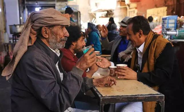 People chat at a coffee shop in Sanaa, Yemen, Monday, Sept. 14, 2026. (AP Photo/Osamah Abdulrahman)