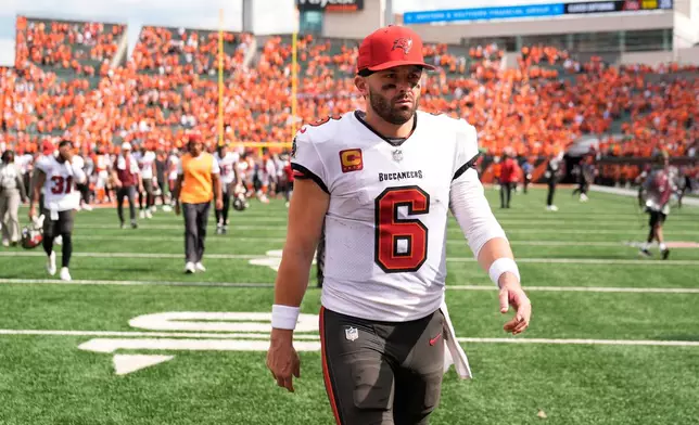 Tampa Bay Buccaneers quarterback Baker Mayfield (6) leaves the field after a 33-27 loss to the Cincinnati Bengals in an NFL football game Sunday, Sept. 13, 2026, in Cincinnati. (AP Photo/Carolyn Kaster)