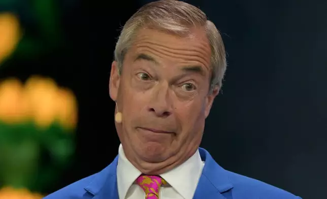 Reform Party Leader Nigel Farage speaks during a special tribute to Ann Widdecombe at the Reform party's annual conference at the National Exhibition Centre in Birmingham, England, Friday, Sept. 4, 2026. (AP Photo/Thomas Krych)
