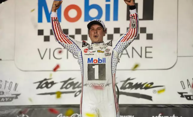 Christopher Bell celebrates in Victory Lane after winning a NASCAR Cup Series auto race Sunday, Sept. 6, 2026, in Darlington, S.C. (AP Photo/Matt Kelley)
