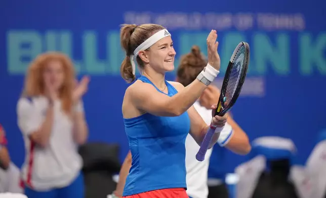 Czech Republic's Karolina Muchova celebrates winning her match against Ukraine's Anhelina Kalinina during the Billie Jean King Cup women's singles final between Ukraine and the Czech Republic, in Shenzhen, China, Sunday, Sept. 27, 2026. (AP Photo/Andy Wong)