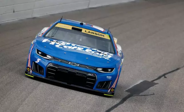 Kyle Larson heads through Turn 1 during a NASCAR Cup Series auto race at Kansas Speedway in Kansas City, Kan., Sunday, Sept. 27, 2026. (AP Photo/Colin E. Braley)