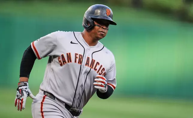 San Francisco Giants' Rafael Devers rounds the bases after hitting a solo home run off Pittsburgh Pirates pitcher Bubba Chandler during the first inning of a baseball game in Pittsburgh, Wednesday, Sept. 2, 2026. (AP Photo/Gene J. Puskar)