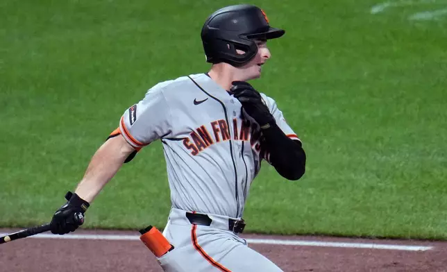 San Francisco Giants' Turner Hill singles off Pittsburgh Pirates pitcher Bubba Chandler during the fifth inning, driving in a run during the fifth inning of a baseball game in Pittsburgh, Wednesday, Sept. 2, 2026. (AP Photo/Gene J. Puskar)