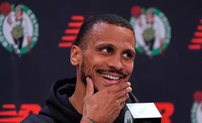 Boston Celtics head coach Joe Mazzulla listens to a reporter's question during the NBA basketball team¥s media day, Monday, Sept. 28, 2026, in Boston. (AP Photo/Charles Krupa)