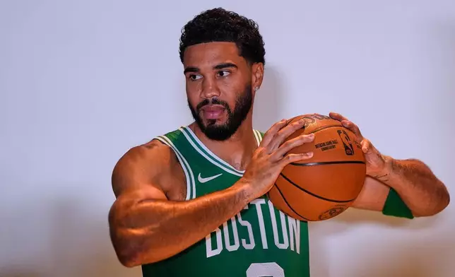 Boston Celtics' Jayson Tatum poses during the NBA basketball team's media day, Monday, Sept. 28, 2026, in Boston. (AP Photo/Charles Krupa)
