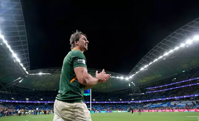 FILE - South Africa's Eben Etzebeth celebrates his team's victory over Australia in their Championship Rugby test match in Sydney on Sept. 3, 2022. (AP Photo/Rick Rycroft, File)