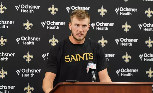 New Orleans Saints quarterback Tyler Shough talks to reporters after an NFL football game against the New Orleans Saints in Baltimore, Sunday, Sept. 20, 2026. (AP Photo/Stephanie Scarbrough)