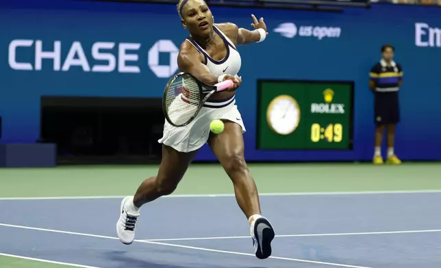 Serena Williams, of the United States, hits a return as she plays a women's doubles match with partner Venus Williams against Hao-Ching Chan, of Taiwan, and Maya Joint, at the U.S. Open tennis championships, Friday, Sept. 4, 2026, in New York. (AP Photo/Adam Hunger)