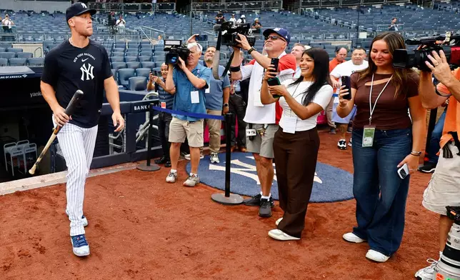 Aaron Judge steps on the field for batting practice before a baseball game against the Colorado Rockies, Tuesday, Sept. 8, 2026, in New York. (AP Photo/Noah K. Murray)
