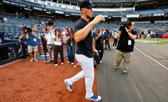 Aaron Judge steps on the field for batting practice before a baseball game against the Colorado Rockies, Tuesday, Sept. 8, 2026, in New York. (AP Photo/Noah K. Murray)