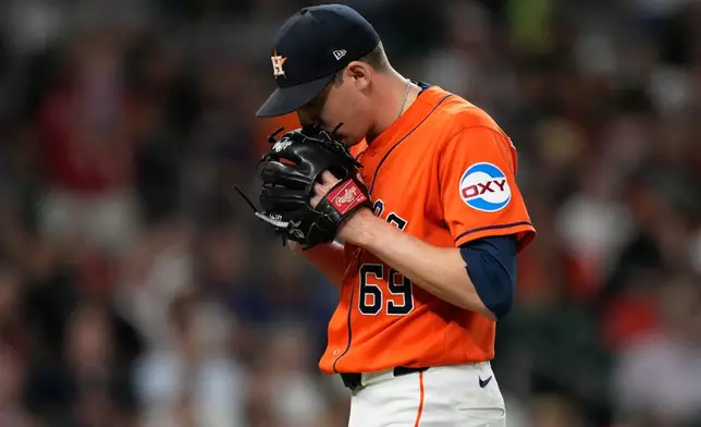 Houston Astros pitcher AJ Blubaugh leaves the mound during the seventh inning of a baseball game against the Atlanta Braves in Houston, Friday, Sept. 18, 2026. (AP Photo/Ashley Landis)