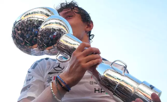 Mercedes driver Mercedes driver Andrea Kimi Antonelli of Italy celebrates after winning the Italian Formula One Grand Prix race, in Monza, Italy, Sunday, Sept. 6, 2026. (AP Photo/Antonio Calanni)