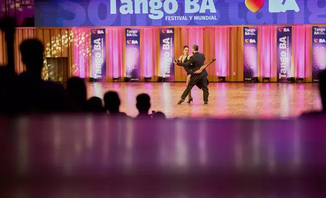 Eliana Mola and Fabian Rodriguez compete in the Tango World Championship in Buenos Aires, Argentina, Friday, Aug. 28, 2026. (AP Photo/Rodrigo Abd)