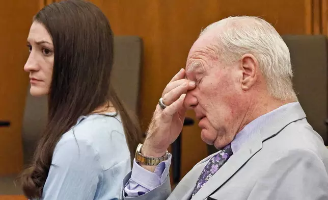 Lindsay Clancy and attorney Kevin Reddington watch as Judge William Sullivan tells the jury to keep discussing a possible verdict after jurors said for a second time they couldn't agree whether Lindsay Clancy was criminally responsible for killing her three children in 2023, Wednesday, Sept. 2, 2026, in Plymouth, Mass. (Greg Derr/The Patriot Ledger via AP, Pool)