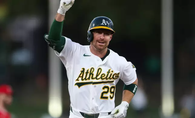Athletics' Donovan Walton gestures as he jogs around the bases after hitting a three-run home run during the first inning of a baseball game against the Los Angeles Angels Wednesday, Sept. 23, 2026, in West Sacramento, Calif. (AP Photo/Scott Marshall)