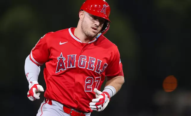 Los Angeles Angels' Mike Trout jogs around the bases after hitting a solo home run during the fourth inning of a baseball game against the Athletics Wednesday, Sept. 23, 2026, in West Sacramento, Calif. (AP Photo/Scott Marshall)