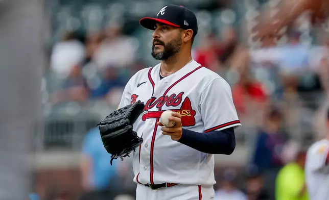 Atlanta Braves pitcher Martín Pérez pauses in between Tampa Bay Rays batter during the first inning of a baseball game, Thursday, Sept. 10, 2026, in Atlanta. (AP Photo/Erik S. Lesser)