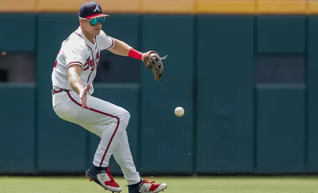 Atlanta Braves left fielder Brewer Hicklen fields a single hit by Tampa Bay Rays' Ryan Vilade during the first inning of a baseball game, Thursday, Sept. 10, 2026, in Atlanta. (AP Photo/Erik S. Lesser)