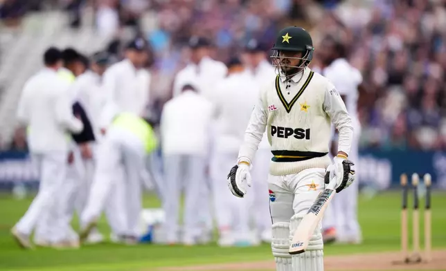 Pakistan's Azan Awais walks off the pitch, after being dismissed by England's Jofra Archer, during day one of the third cricket test match between England and Pakistan, at Edgbaston, in Birmingham, England, Wednesday, Sept. 9, 2026. (Mike Egerton/PA via AP)