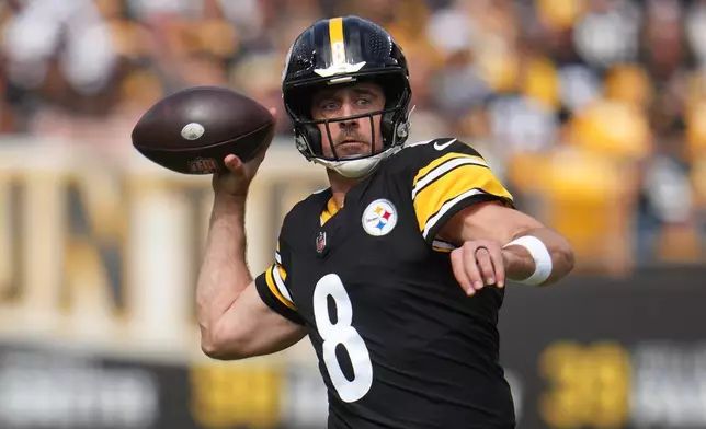 Pittsburgh Steelers quarterback Aaron Rodgers throws a pass during the first half of an NFL football game against the Cincinnati Bengals in Pittsburgh, Sunday, Sept. 27, 2026. (AP Photo/Gene J. Puskar)