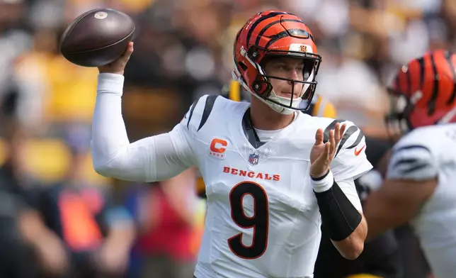 Cincinnati Bengals quarterback Joe Burrow throws a pass during the first half of an NFL football game against the Pittsburgh Steelers in Pittsburgh, Sunday, Sept. 27, 2026. (AP Photo/Gene J. Puskar)