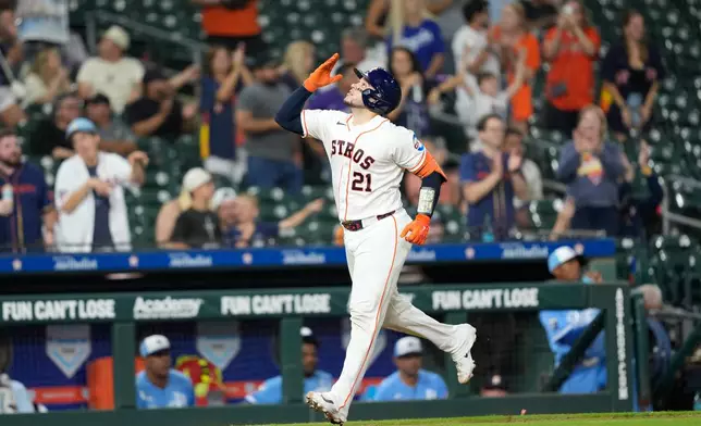 Houston Astros' Yainer Diaz celebrates after hitting a home run against the Kansas City Royals during the ninth inning of a baseball game Wednesday, Sept. 16, 2026, in Houston. (AP Photo/David J. Phillip)