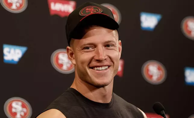 San Francisco 49ers running back Christian McCaffrey speaks at a news conference after an NFL football game against the Miami Dolphins in Santa Clara, Calif., Sunday, Sept. 20, 2026. (AP Photo/Kelley L. Cox)