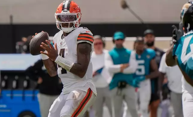 Cleveland Browns quarterback Deshaun Watson (4) passes in the second half of an NFL football game against the Jacksonville Jaguars, Sunday, Sept. 13, 2026, in Jacksonville. (AP Photo/Mike Stewart)