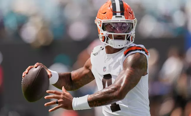 Cleveland Browns quarterback Deshaun Watson (4) throws before an NFL football game against the Jacksonville Jaguars, Sunday, Sept. 13, 2026, in Jacksonville. (AP Photo/Mike Stewart)