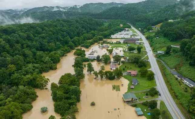 FILE - Homes and structures are flooded near Quicksand, Ky., July 28, 2022. (Ryan C. Hermens/Lexington Herald-Leader via AP, File)