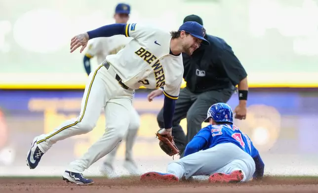Chicago Cubs' Pete Crow-Armstrong, right, steals second base as Milwaukee Brewers second baseman Brice Turang (2) is late to the tag during the fifth inning of a baseball game Monday, Sept. 7, 2026, in Milwaukee. (AP Photo/Kayla Wolf)