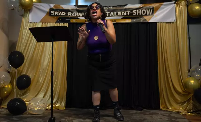 Cara Agrusa performs during Skid Row's inaugural talent show in downtown Los Angeles, Saturday, Sept. 19, 2026. (AP Photo/Jae C. Hong)