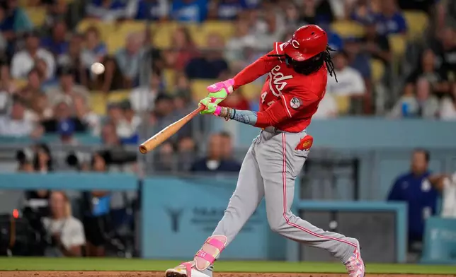 Cincinnati Reds' Elly De La Cruz hits a solo home run during fourth inning of a baseball game against the Los Angeles Dodgers, Wednesday, Sept. 9, 2026, in Los Angeles. (AP Photo/Mark J. Terrill)