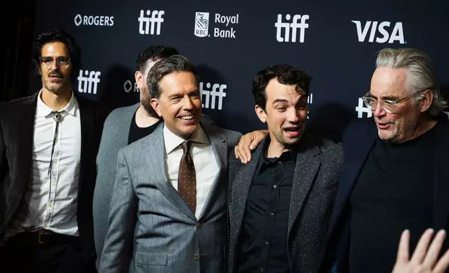 Ed Helms, front left, Jay Baruchel and Michael Dowse are pictured on the red carpet for "The Stunt Driver" at the Toronto International Film Festival in Toronto, Ontario, Friday, Sept. 11, 2026. (Laura Proctor/The Canadian Press via AP)