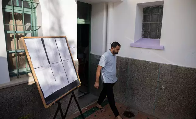 A man walks out after casting his vote inside a polling station during the legislative elections in Rabat, Morocco, Wednesday, Sept. 23, 2026. (AP Photo/Mosa'ab Elshamy)