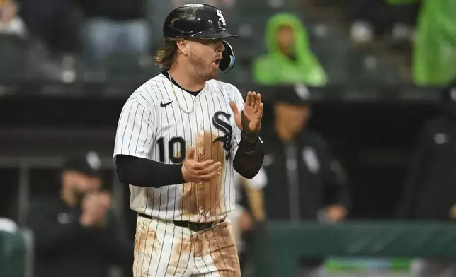 Chicago White Sox's Chase Meidroth celebrates after scoring on a Braden Montgomery single during the second inning of a baseball game against the Detroit Tigers, Sunday, Sept. 20, 2026, in Chicago. (AP Photo/Paul Beaty)