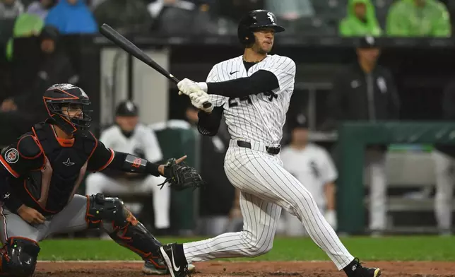 Chicago White Sox's Braden Montgomery watches his RBI single during the second inning of a baseball game against the Detroit Tigers, Sunday, Sept. 20, 2026, in Chicago. (AP Photo/Paul Beaty)