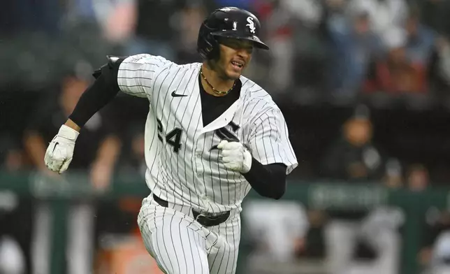 Chicago White Sox's Braden Montgomery watches his RBI single during the second inning of a baseball game against the Detroit Tigers, Sunday, Sept. 20, 2026, in Chicago. (AP Photo/Paul Beaty)